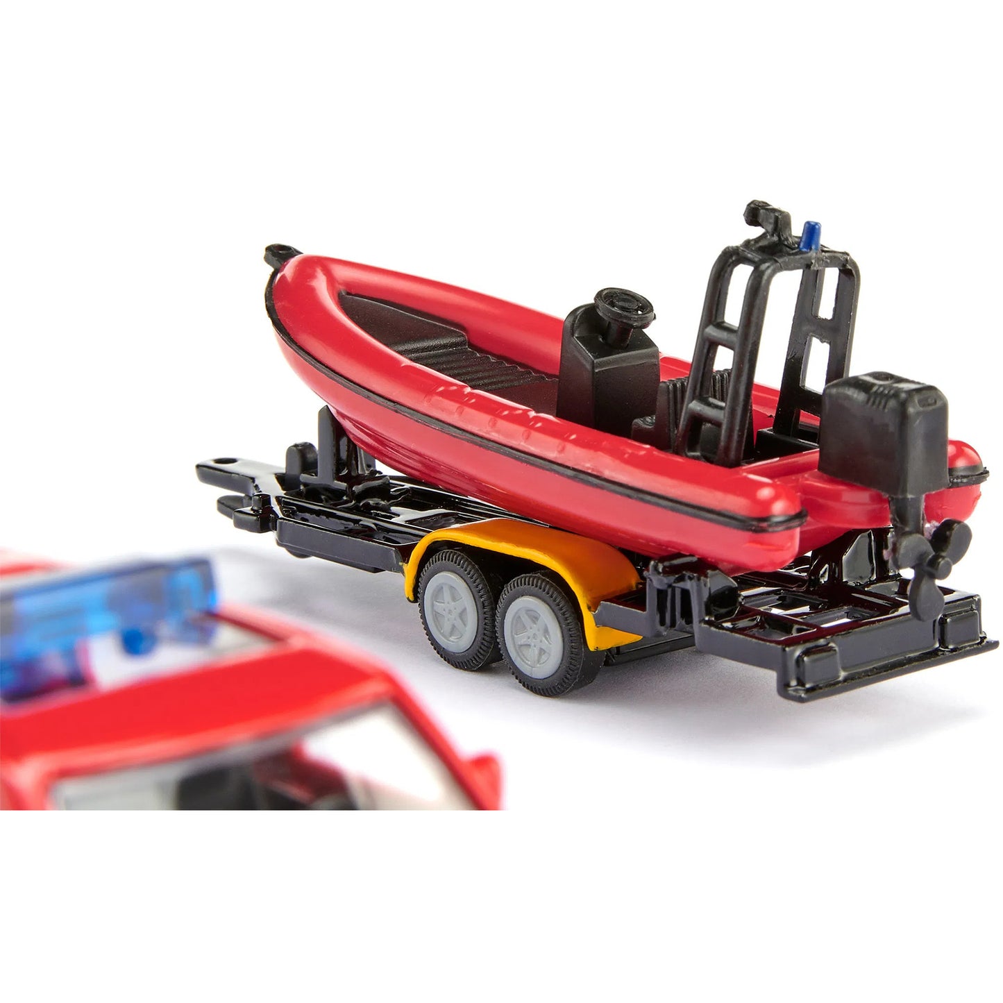 BLISTER Land Rover Defender mit Boot, Modellfahrzeug